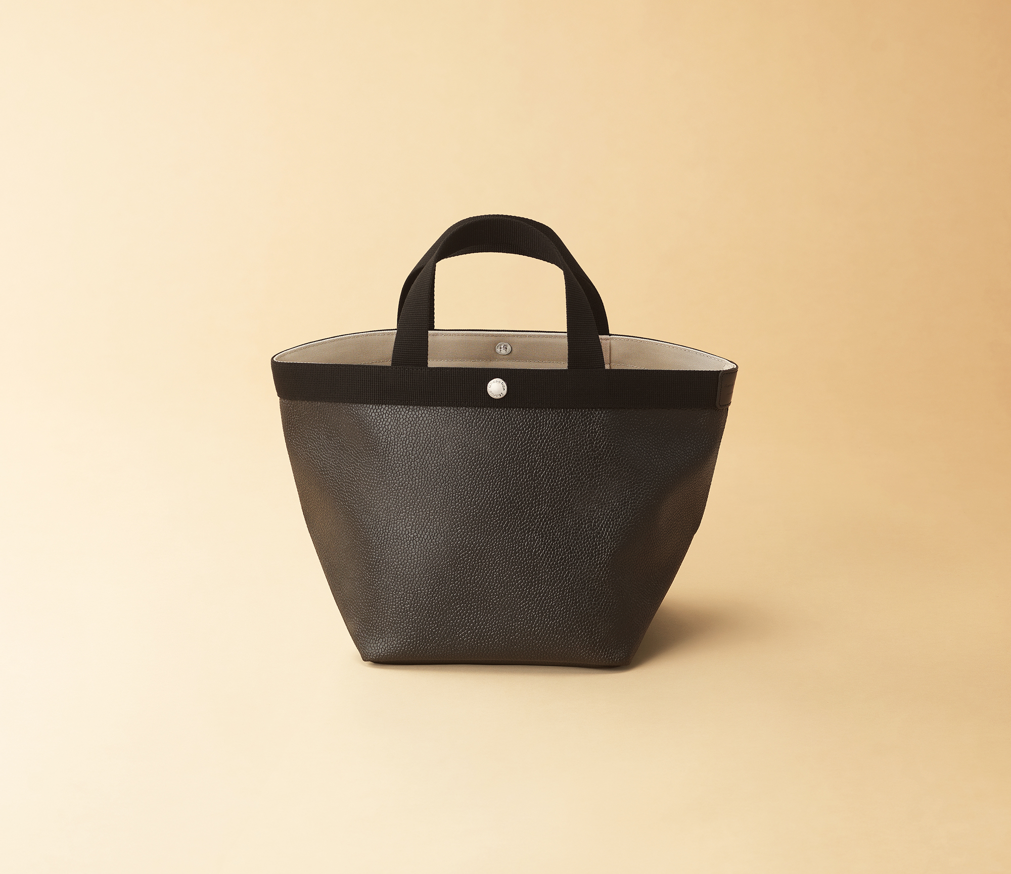 Pebbled grain coated canvas Pebbled grain coated canvas